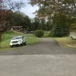 FRESH SEALCOATING A LONG RESIDENTIAL DRIVE IN NEW CASTLE