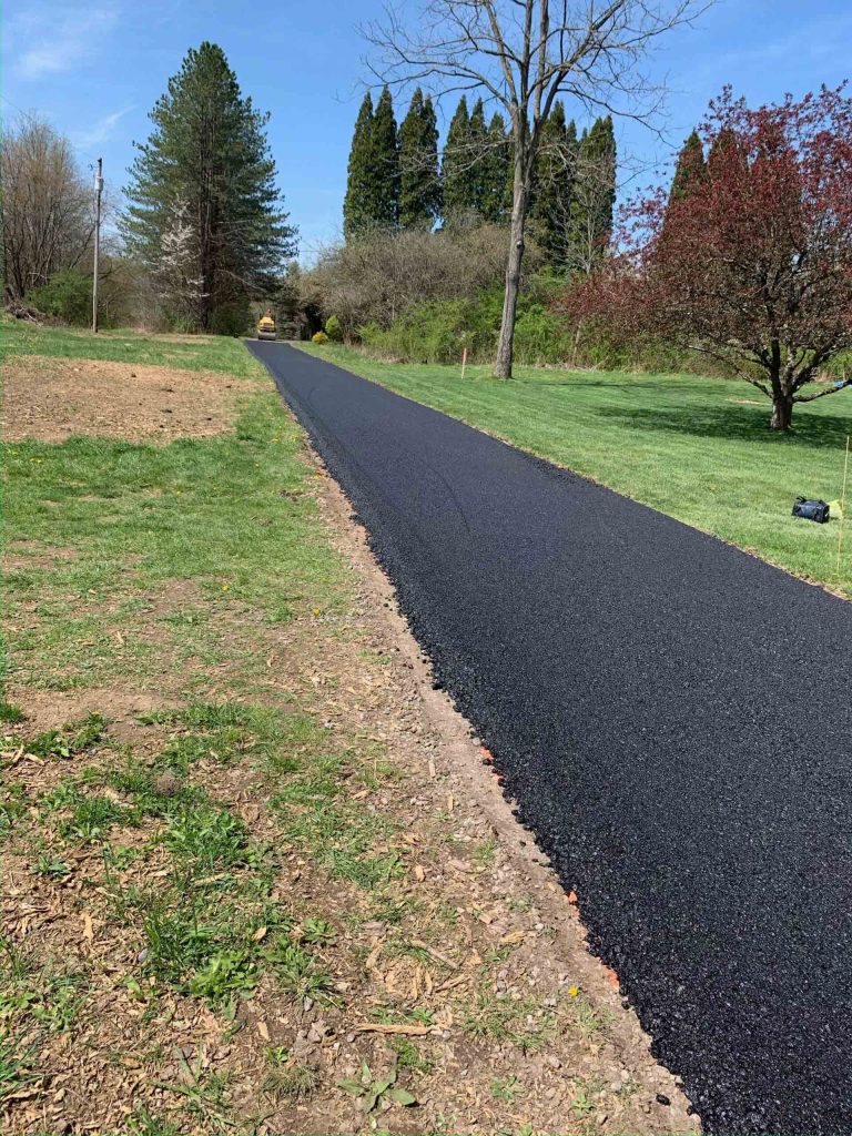 LONG LINES OF FRESH ASPHALT IN NEW CASTLE