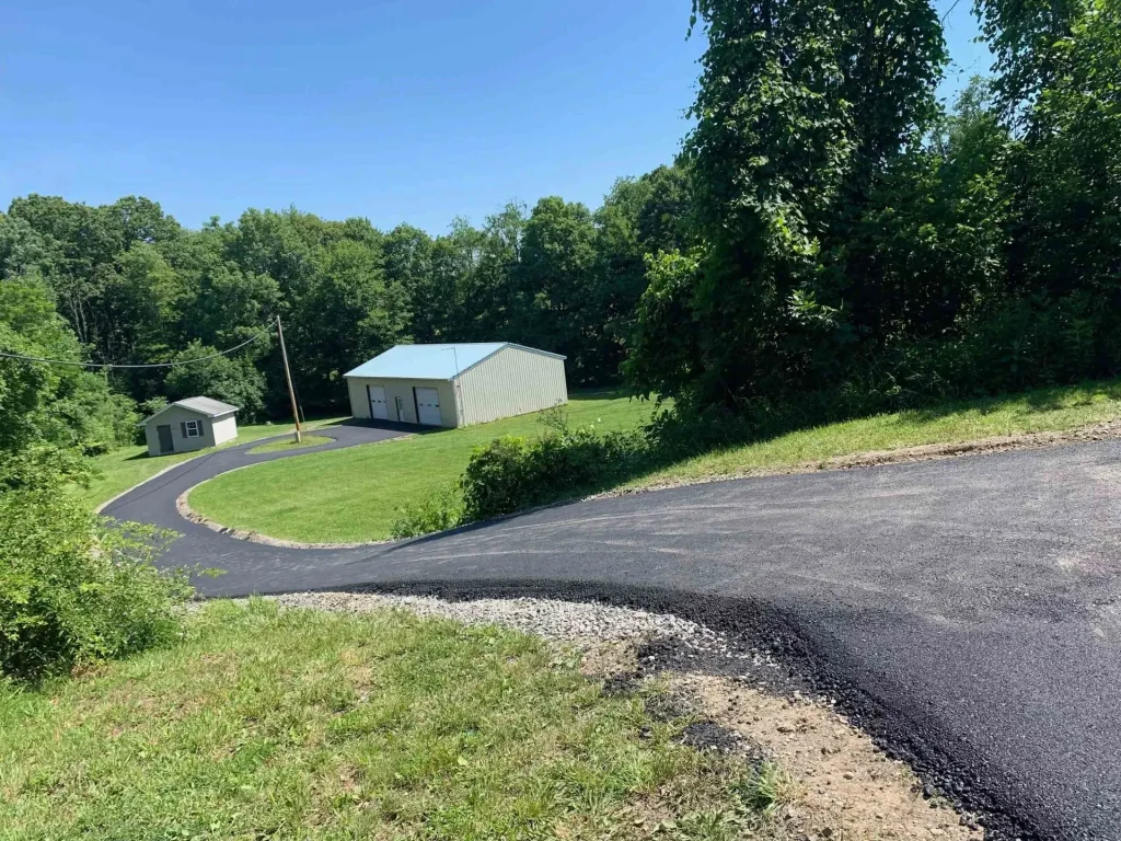 LONG COUNTRY DRIVE PAVED IN CLINTON