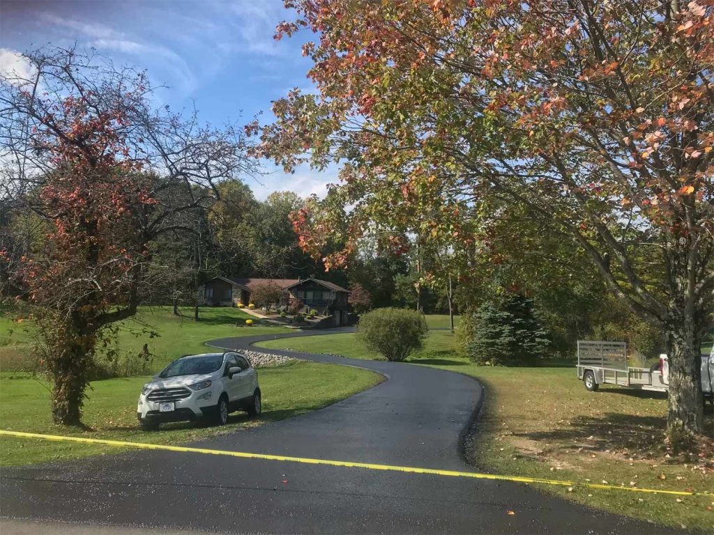 FRESH SEALCOATING A LONG RESIDENTIAL DRIVE IN NEW CASTLE